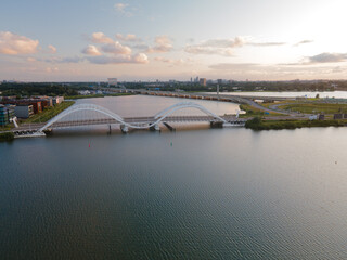 Aerial drone video of the Enneus Heermabrug in Amsterdam, The Netherlands going to Ijburg and Steigereiland Amsterdam Oost east.