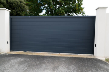 slide high gray door grey sliding metal gate house portal of suburb home