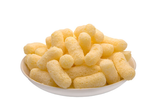 Corn puffs, finger food on a plate.