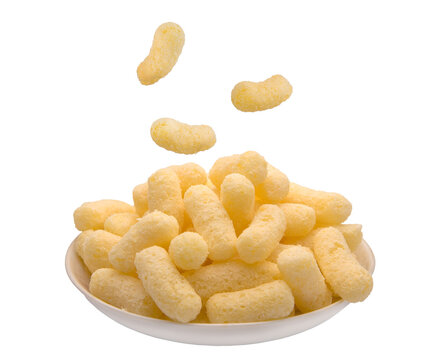 Corn puffs, finger food on a plate.