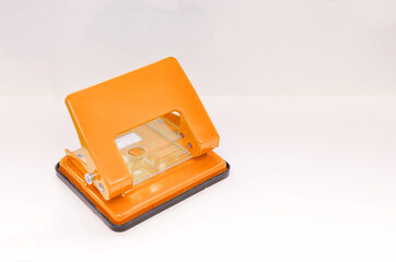 Paper hole punch in white backgound