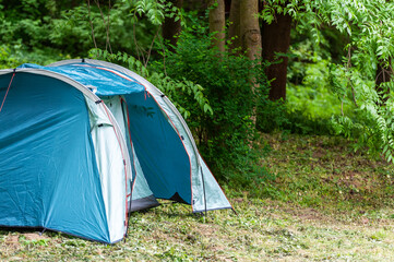 Camping and tent under the  forest .