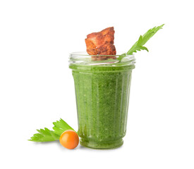 Glass of bloody Mary cocktail garnished with bacon, cape gooseberry and celery on white background