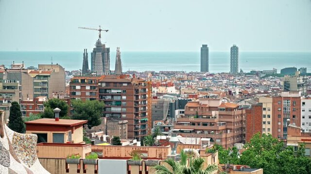 Panoramic view of Barcelona, multiple building's roofs, view from the Parc Guell, Spain