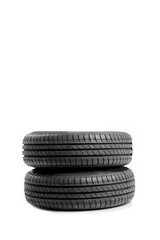 Fototapeta na wymiar New car tire on white background.