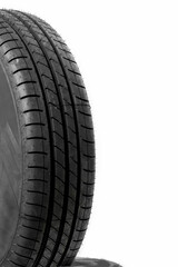 New car tire on white background.