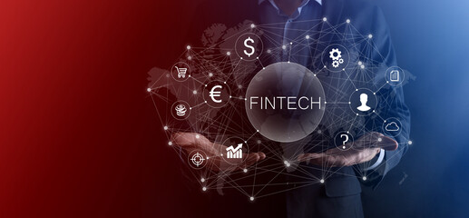 Businessman hold Fintech -financial technology concept.Business investment banking payment. Cryptocurrency investment and digital money. Business concept on virtual screen.