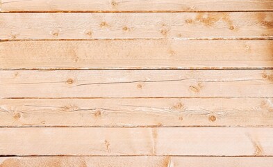 Naklejka premium Wooden background, horizontal wooden boards with small longitudinal cracks, light brown