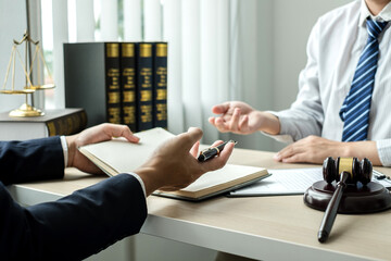 Male lawyers or a judge counseling clients about judicial justice and prosecution with scales,...