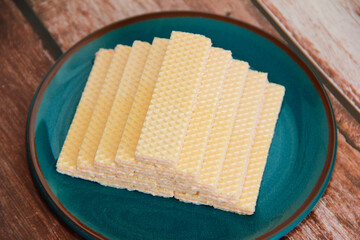 sweet fluted waffles on a decorative plate