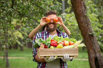 Farmer with apple as glasses - 451144948