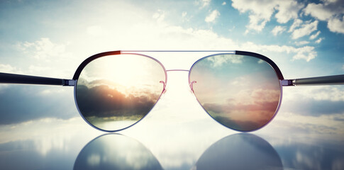 Fototapeta na wymiar Polarized sunglasses on sunny sky UV protection