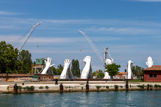 Lorenzo Quinn's Giant Stone Hands Represent Humanity&rsquo;s Universal Values At Venice Art Biennale in Venice, Italy
