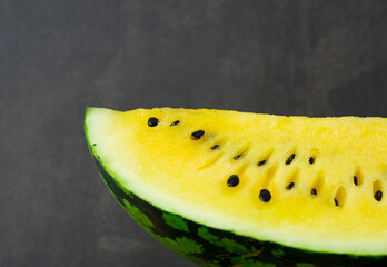Close-up shot of the ripe yellow watermelon.