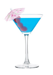 Blue lagoon cocktail in martini glass with sweet cherry and umbrella on white.