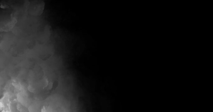 White Smoke with copyspace. Smoke footage easy to add in composition in screen mode. Abstract white clouds effect as fog or smoke on black background. Vapor and clouds