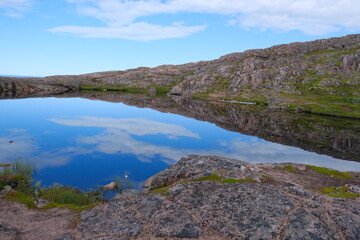 Lake on the top of a cliff near Teriberka, Murmansk region, Russia