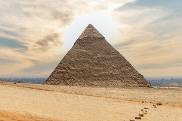 Fototapeta na wymiar The Pyramid of Khafre with dramatic sky in Egypt