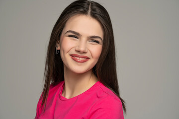 Fototapeta premium portrait of a smiling happy teen girl with long straight hair