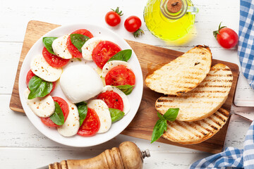 Caprese salad with mozzarella, basil and garden tomatoes