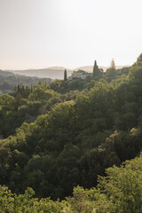 Fototapeta na wymiar Panorama of the beautiful and green countryside of Perugia during sunrise, Umbria