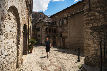 person walking in the old town