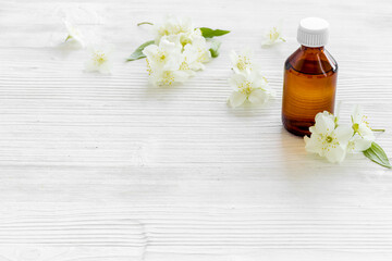 Jasmine flowers essential massage oil. Perfume oil with jasmine