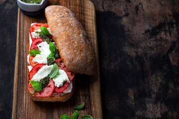 ciabatta bread with mozzarella, tomatoes and basil - obrazy, fototapety, plakaty