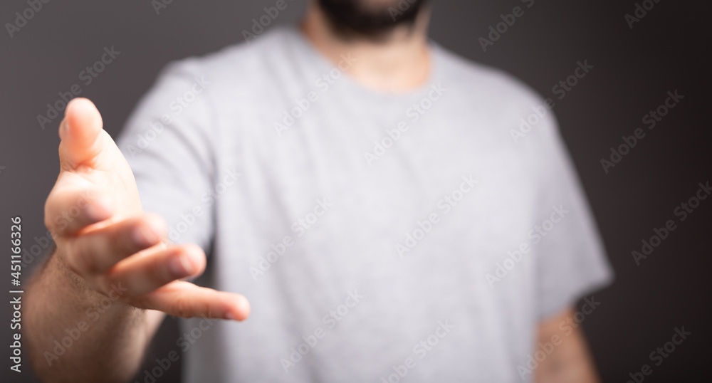 Poster man showing his empty hand.