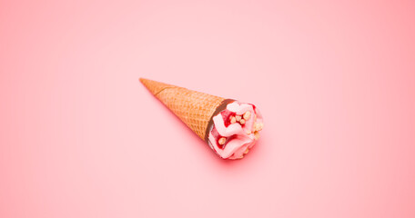 Close-up detail Top view, Ice cream cone strawberry isolated on the floor pink background.