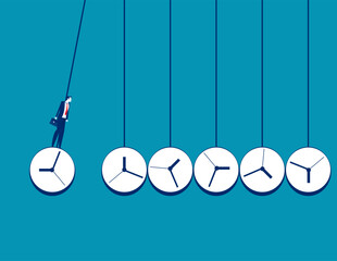 Business time management. Newton's cradle with watch