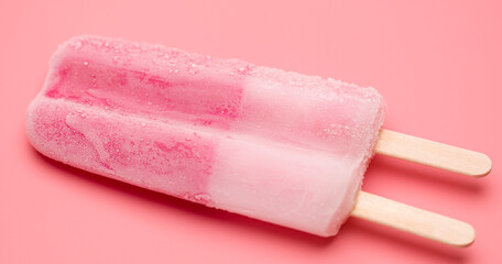 Close-up detail Top view, ice cream popsicle stick isolated on pink background.