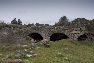 Fototapeta na wymiar Ruins of a former water mill by the river Manzanares, municipality of Colmenar Viejo, province of Madrid, Spain