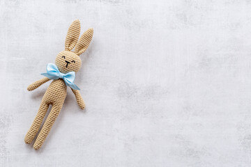 Plush toy rabbit for newborn baby - background for baby shower