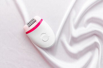 Hair remover epolator on silk - for gentle depilation