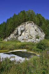 Fototapeta na wymiar Rock of white gypsum Stone Karavai (Loaf)