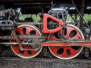 Wheels and mechanisms of a steam locomotive at the Ruskeala station in Karelia