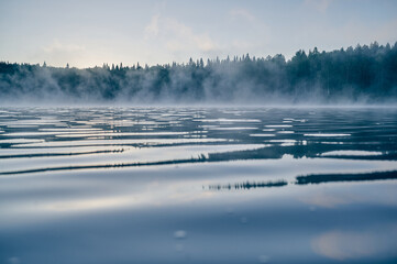 Fototapeta premium Morning fog rising over the river