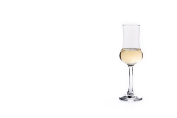 Italian golden grappa drink isolated on white background. Copy space
