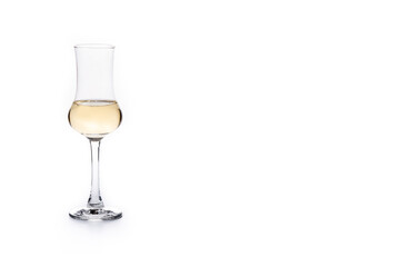 Italian golden grappa drink isolated on white background. Copy space