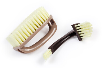 Composite clothes brush disassembled into its component parts