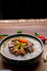 Coto Makassar is a traditional food of Makassar, Indonesia. This food is made from boiled offal (stomach contents) in a long time and seasoned with specially formulated spices