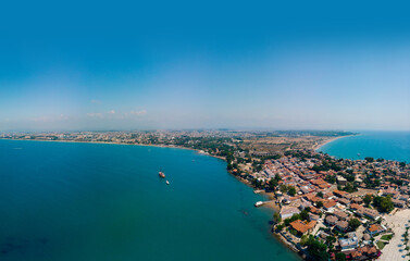 Naklejka na ściany i meble Wide panorama. Aerial view of the bay, ships and boats. Touristic place, ancient buildings, the Colosseum and the Temple of Apollo. Turkey, Manavgad, Side. Copy space