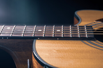 Obraz premium Close-up of a body part of an acoustic guitar.