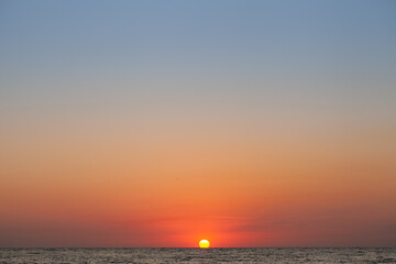 Peace and quiet on the seashore at sunset.