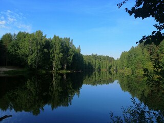 Fototapeta na wymiar Landscapes of Russia. Lake in the forest