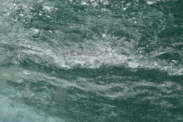 Fototapeta na wymiar inside a wave fromthe bottom of the sea