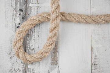Obraz premium Ropes on a wooden background