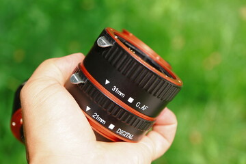 The macro rings of the dlf camera are made of black and red plastic