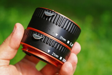 The macro rings of the dlf camera are made of black and red plastic